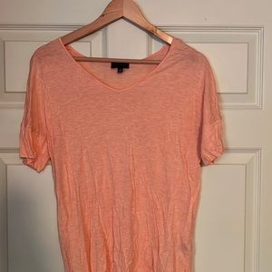Peach colored V-neck T-shirt